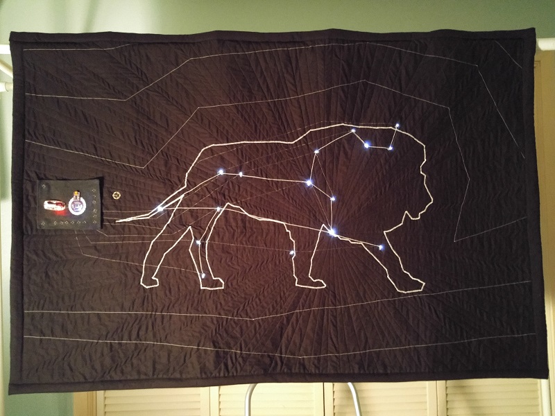 Image of Leo Constellation quilt hanging
